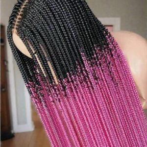 A person with a long tribal braids wig on their head