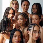 Group of ten women with diverse braided hairstyles, standing together against a light background.